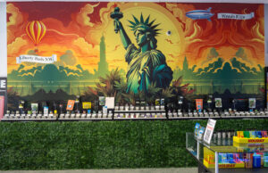A mural and product display inside the Liberty Buds dispensary