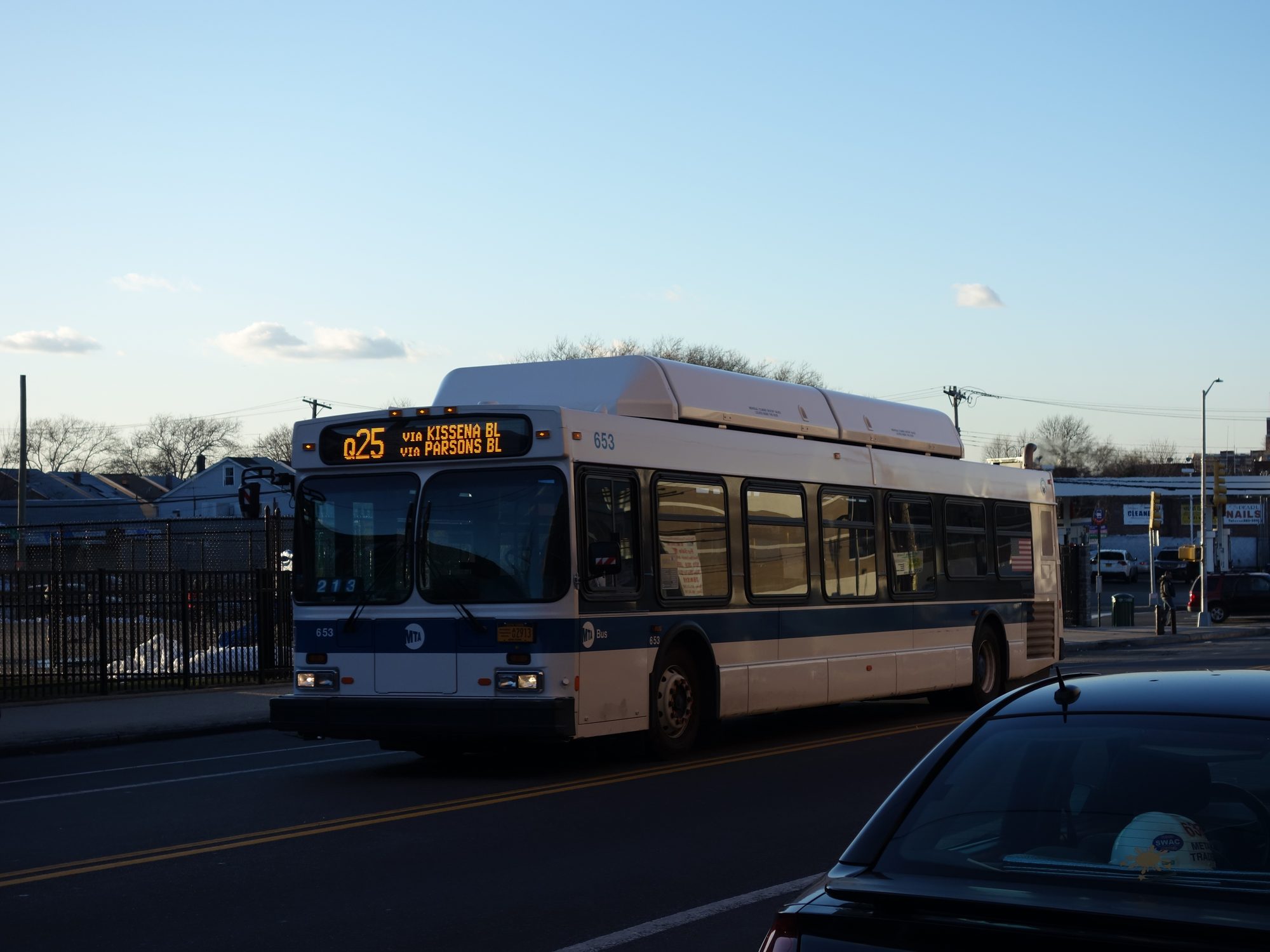A Q25 bus traveling south on Parsons Boulevard near Union Turnpike at the Briarwood edge in Queens.